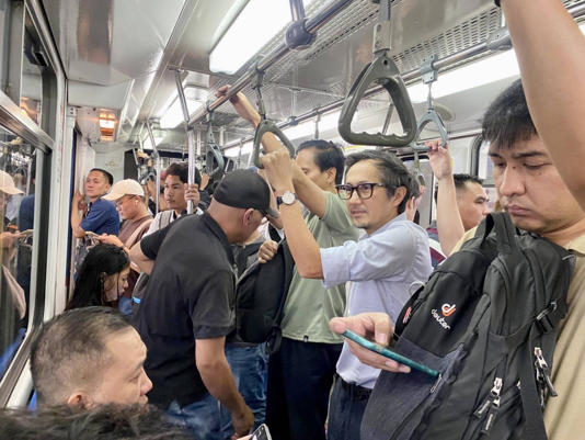 Transport Chief Dizon Rides MRT-3, Promises Service Upgrades